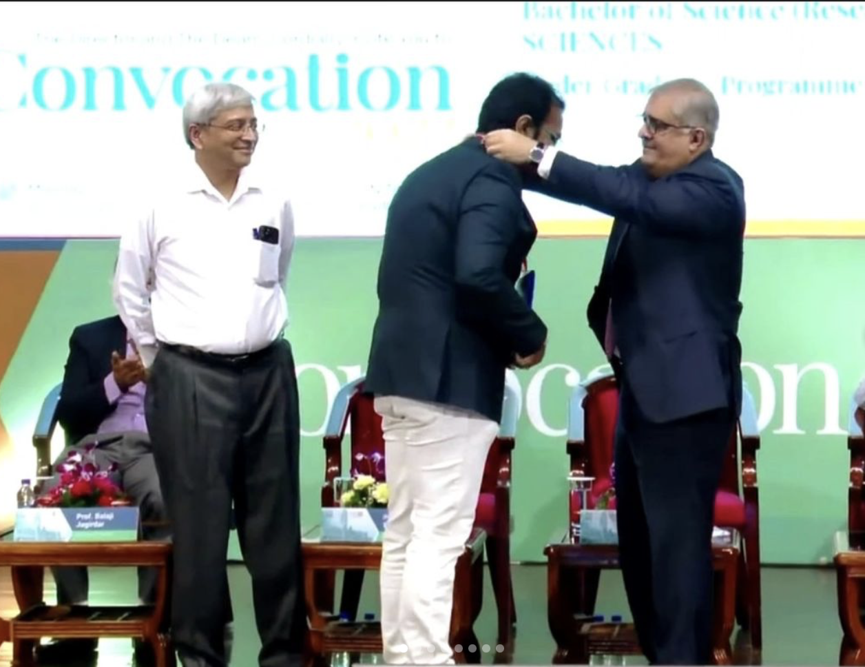 Receiving Gold Medal at IISc Bangalore